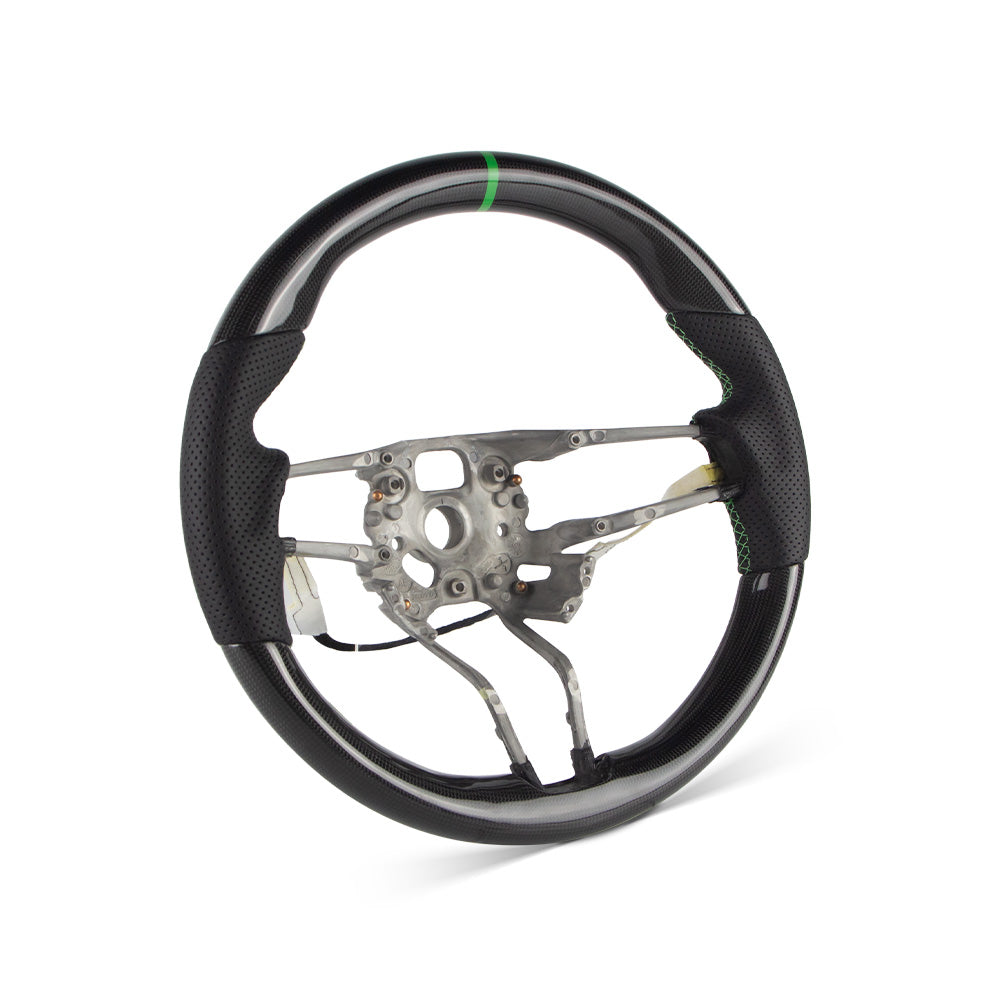 <img src="steering-wheel-side.jpg" alt="Porsche 991 carbon fiber steering wheel">​